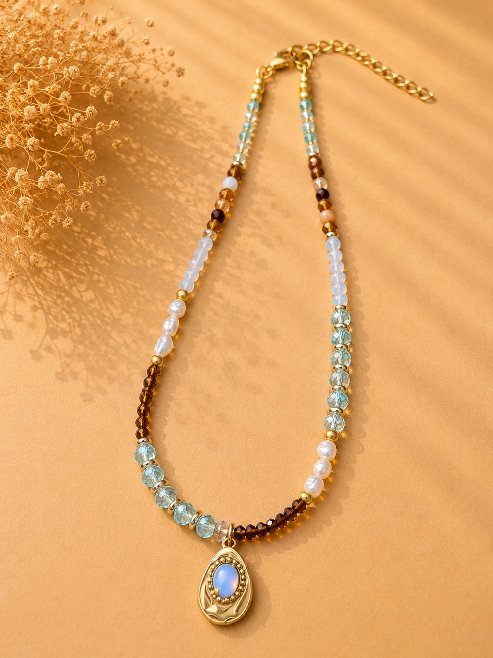 Gold Pendant Beaded Necklace with Light Blue and Pearl Accents and Opal pendant